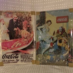 Two tin Coca-Cola retro look posters; 12x8 inches, new.